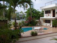 The poll and the room of the Hotel CASA COCO - Boca Chica - Dominican Republic
